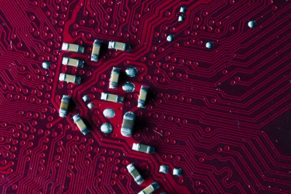 27858624_macro-picture-of-red-printed-circuit-board-pcb